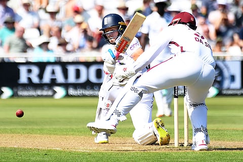 Ollie Pope plays a shot against West Indies